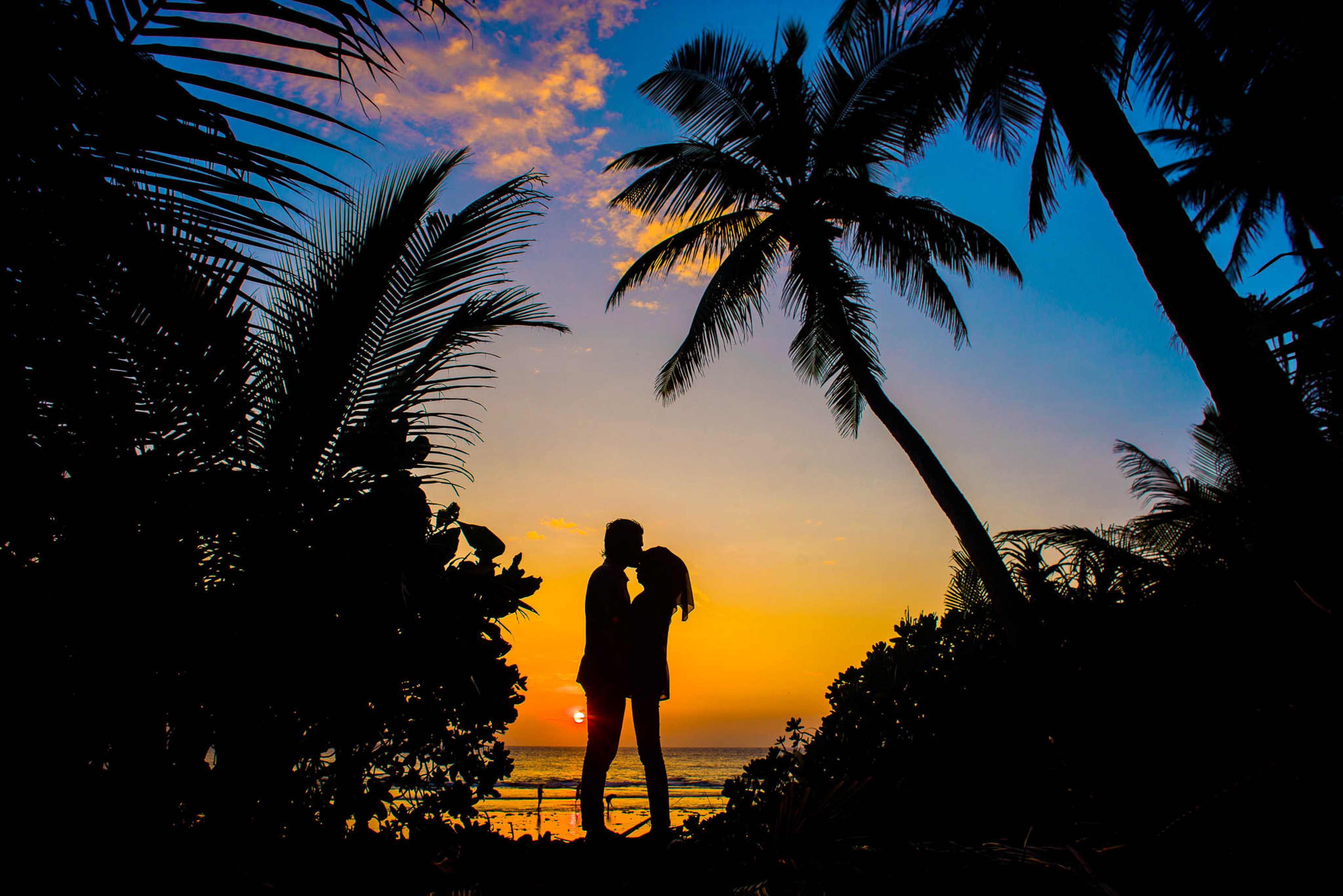 Photo by Asad Photo Maldives: https://www.pexels.com/photo/silhouette-of-man-and-woman-kissing-1024975/