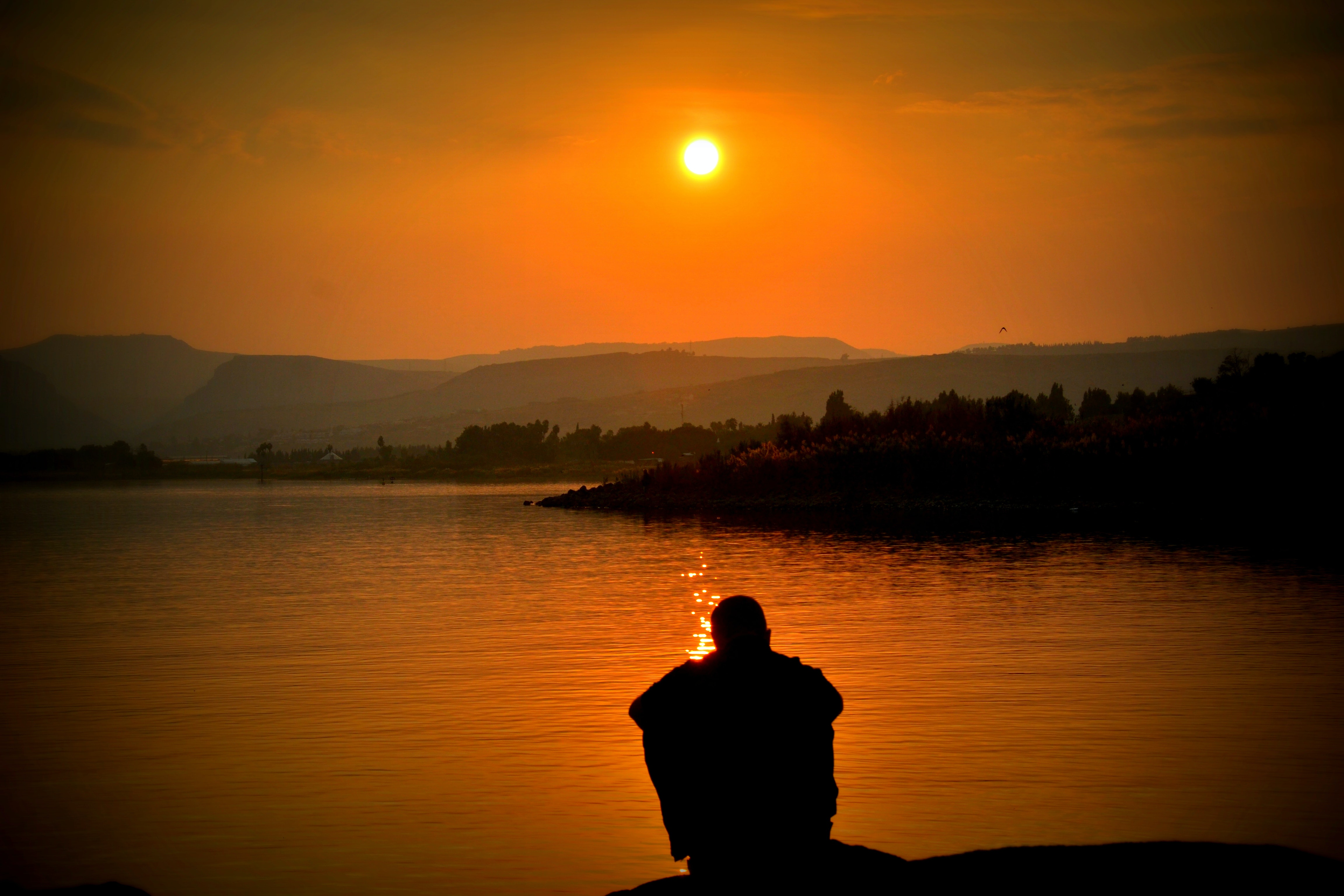 Photo by Download a pic Donate a buck! ^: https://www.pexels.com/photo/silhouette-of-person-sitting-beside-body-of-water-54379/